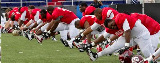 Football players stretching